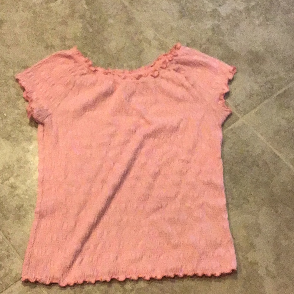 Pink ruffled shirt